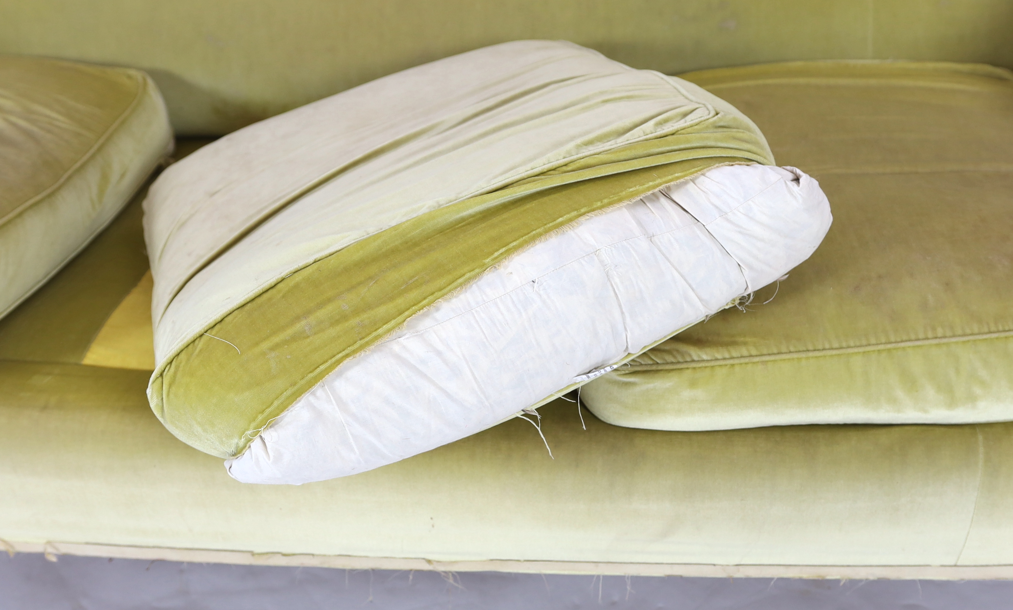 A large Victorian style sofa in the manner of Howard & Sons, 240cm wide, 92cm deep, 85cm high